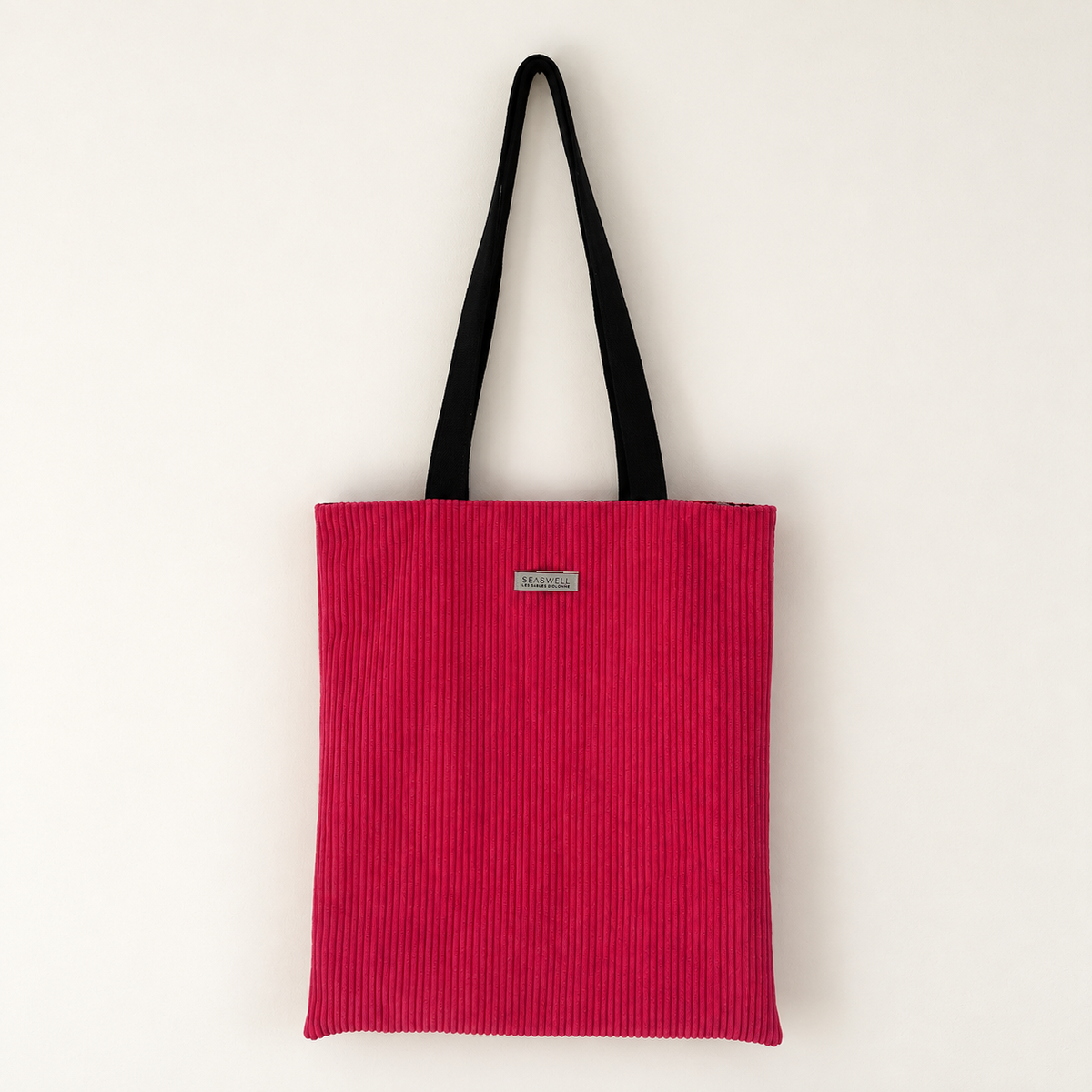 Tote bag SeaSwell en velours côtelé fuchsia avec anses noires, vue de face